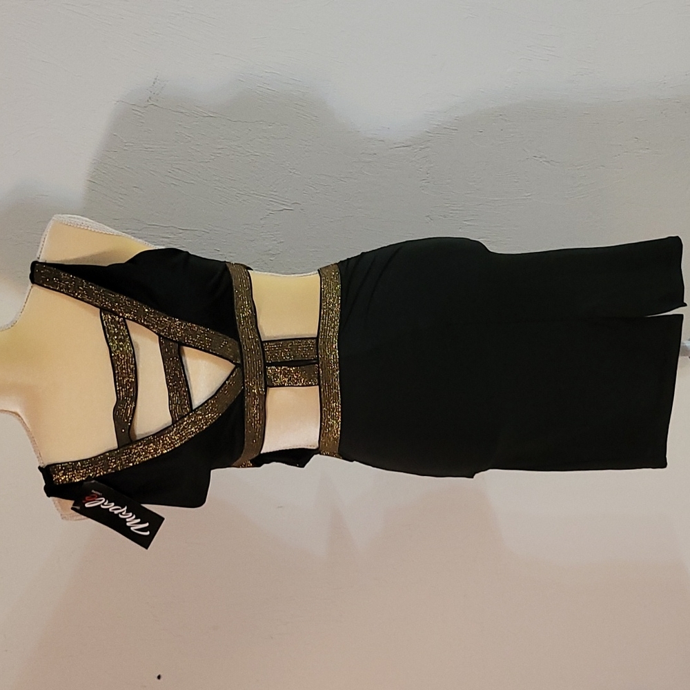 It's very sexy black and gold cut out dress